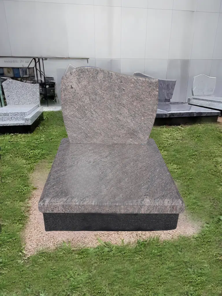 Monument funéraire classique en granite gris poli avec stèle rectangulaire.